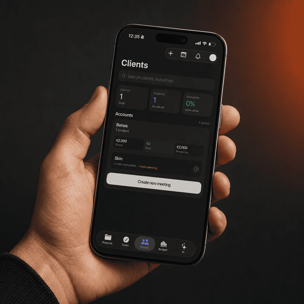Hand holding a smartphone with a client application interface